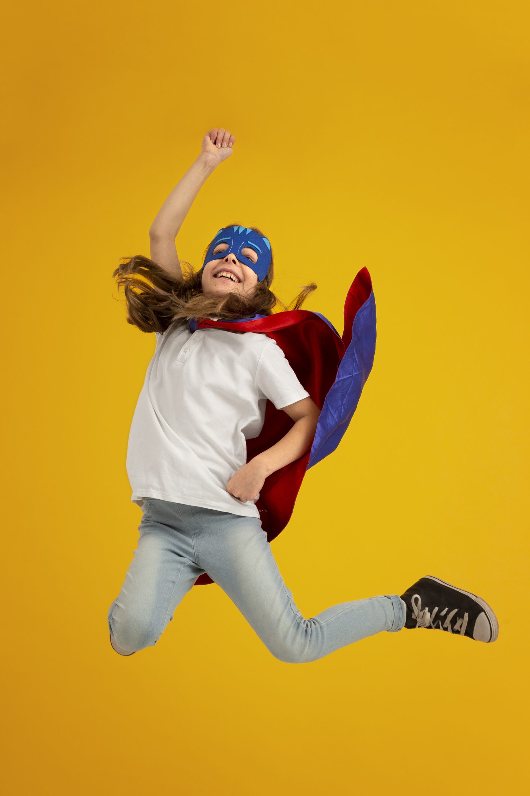 portrait-young-girl-with-superhero-cape